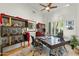 Spacious home office with built-in shelving and large desk at 11127 E Mirasol Cir, Scottsdale, AZ 85255