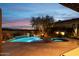 Luxury pool and spa with fire pit and mountain views at 11127 E Mirasol Cir, Scottsdale, AZ 85255