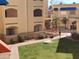 Ground level view of the community with landscaping and walkways at 12221 W Bell Rd # 259, Surprise, AZ 85378