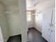 Convenient laundry area with tile flooring, storage cabinets, and natural light at 12221 W Bell Rd # 259, Surprise, AZ 85378