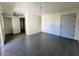 Spacious living room featuring tile floors, ceiling fan and neutral walls at 12221 W Bell Rd # 259, Surprise, AZ 85378