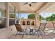 Relaxing patio with fireplace and seating area at 12333 W Fetlock Trl, Peoria, AZ 85383