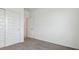 Spacious bedroom with double door closet and neutral carpeting at 1543 E Lardner Dr, Casa Grande, AZ 85122