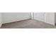 Bright bedroom featuring neutral wall-to-wall carpet at 1543 E Lardner Dr, Casa Grande, AZ 85122