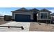 Charming single-story home with a two-car garage and low-maintenance gravel landscaping at 1543 E Lardner Dr, Casa Grande, AZ 85122