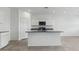 Modern kitchen with stainless steel appliances and granite countertops at 1543 E Lardner Dr, Casa Grande, AZ 85122