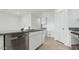 Modern kitchen with stainless steel dishwasher and granite countertops at 1543 E Lardner Dr, Casa Grande, AZ 85122