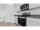 Stainless steel stove and microwave in a modern kitchen at 1543 E Lardner Dr, Casa Grande, AZ 85122