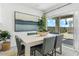 Bright dining room with sliding door access to backyard at 1552 E Mason Dr, Casa Grande, AZ 85122