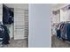 Spacious walk-in closet featuring ample shelving and hanging storage for organized clothing and accessories at 1699 E Hearne Way, Gilbert, AZ 85234
