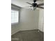 Bright bedroom with ceiling fan and carpeted floor at 1720 E Thunderbird Rd # 2061, Phoenix, AZ 85022