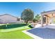 Artificial turf putting green and expansive backyard at 18747 N Sunsites Dr, Surprise, AZ 85387