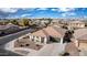 Lovely single-Gathering home with a tile roof and desert landscaping, nestled in a well-maintained neighborhood at 18906 E Cattle Dr, Queen Creek, AZ 85142