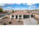Beautiful one story home with desert landscaping, tile roof, and an attached garage, in a friendly neighborhood at 18906 E Cattle Dr, Queen Creek, AZ 85142
