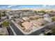 Lovely aerial view of a single-Gathering home in a friendly neighborhood, showcasing its charming exterior and pleasant surroundings at 18906 E Cattle Dr, Queen Creek, AZ 85142
