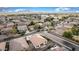 Desirable home set in a welcoming community, showcasing well-maintained homes and tree-lined streets from an aerial view at 18906 E Cattle Dr, Queen Creek, AZ 85142