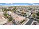 Breathtaking aerial perspective of a home with a private pool, serene backyard, and lush greenery, perfect for outdoor enjoyment at 18906 E Cattle Dr, Queen Creek, AZ 85142