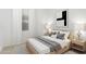 Relaxing bedroom with a comfortable bed, modern art, and soft natural light at 18906 E Cattle Dr, Queen Creek, AZ 85142