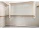 Spacious walk-in closet with ample shelving and rod space for organized storage at 18906 E Cattle Dr, Queen Creek, AZ 85142