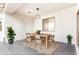 Outdoor dining area with modern furniture, stylish lighting, and a tranquil ambiance at 18906 E Cattle Dr, Queen Creek, AZ 85142