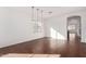 Bright dining room featuring tile flooring and modern pendant lighting at 18906 E Cattle Dr, Queen Creek, AZ 85142