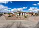 Well-maintained single-story home with desert landscaping and a two-car garage at 18906 E Cattle Dr, Queen Creek, AZ 85142