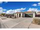 Well-maintained single-story home with desert landscaping and a two-car garage at 18906 E Cattle Dr, Queen Creek, AZ 85142