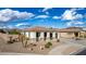 Charming home with front columns and desert landscaping, offering great curb appeal in a lovely neighborhood at 18906 E Cattle Dr, Queen Creek, AZ 85142