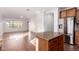 Bright eat-in kitchen area features stainless steel appliances, tile flooring, and breakfast bar at 18906 E Cattle Dr, Queen Creek, AZ 85142