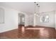 Spacious living room featuring tile flooring and ample natural light at 18906 E Cattle Dr, Queen Creek, AZ 85142