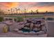 Relaxing water feature creates a tranquil outdoor space at 19528 N Crescent Ridge Dr, Surprise, AZ 85387