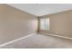 Bedroom featuring neutral walls and carpet and window with blinds at 2025 E Campbell Ave # 140, Phoenix, AZ 85016