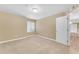 Cozy bedroom featuring plush carpet floors and a large window at 2025 E Campbell Ave # 140, Phoenix, AZ 85016