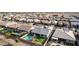 A bird's-eye view showcases a well-equipped backyard with a pool, artificial grass, and a trampoline at 21716 E Waverly Dr, Queen Creek, AZ 85142