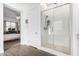 Sleek bathroom featuring a glass-enclosed shower and contemporary design at 21716 E Waverly Dr, Queen Creek, AZ 85142