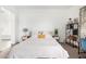 Inviting bedroom featuring a cozy bed, neutral walls, and functional workspace at 21716 E Waverly Dr, Queen Creek, AZ 85142