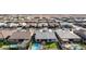 An aerial view of a neatly planned residential community, each home with manicured lawns and private yards at 21716 E Waverly Dr, Queen Creek, AZ 85142