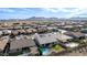 Expansive aerial view showcases a Gathering-friendly neighborhood, complete with lush lawns and private pools at 21716 E Waverly Dr, Queen Creek, AZ 85142