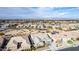 A picturesque aerial view of a neighborhood showcasing well-maintained homes and desert landscaping at 21716 E Waverly Dr, Queen Creek, AZ 85142