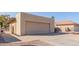 Attached two-car garage with a long driveway at 26006 S Eastlake Dr, Sun Lakes, AZ 85248