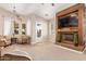 Living room with a fireplace and access to a patio at 2688 E Joy Dr, San Tan Valley, AZ 85140