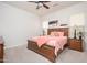 Spacious bedroom with a king-size bed and ensuite access at 26916 W Potter Dr, Buckeye, AZ 85396