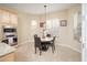 Kitchen nook with a round table and chairs, perfect for casual dining at 26916 W Potter Dr, Buckeye, AZ 85396