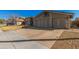 This home has a concrete driveway and three-car garage, offering plenty of parking and storage space at 2715 W Calle Del Norte Dr, Chandler, AZ 85224