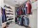 A walk-in closet features plenty of storage space for shoes and clothes at 2715 W Calle Del Norte Dr, Chandler, AZ 85224