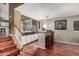 Open bar area with white cabinets, sleek countertop, and barstool seating, ideal for entertaining at 2715 W Calle Del Norte Dr, Chandler, AZ 85224