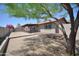 Spacious backyard featuring a covered patio, low-maintenance desert landscaping, and a private setting at 2949 E Willow Ave, Phoenix, AZ 85032