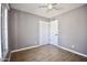 Cozy bedroom with wood-look floors and ample natural light at 2949 E Willow Ave, Phoenix, AZ 85032