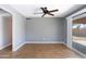 Bright dining area with wood floors and access to backyard at 2949 E Willow Ave, Phoenix, AZ 85032