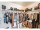 Large walk-in closet with ample hanging and shelving space at 32504 N Cherry Creek Rd, San Tan Valley, AZ 85144